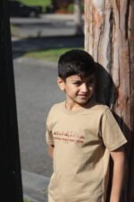 We Are Assyrians, WE DO NOT DISAPPEAR Kids T-shirt